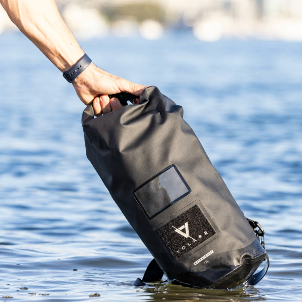 https://www.volaresports.com/cdn/shop/products/Dry-Bag-12ltr-black-waterproof-floating-boat-bag-volare_2048x2048.jpg?v=1661926003